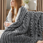 Giftable grey fleece blanket for couch or bed