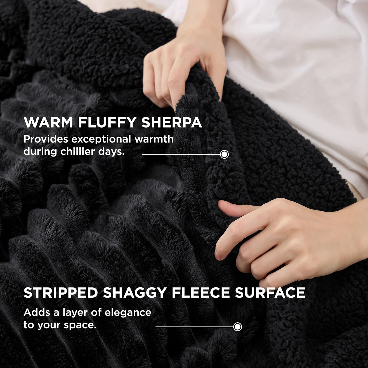 Sleek black fleece throw folded neatly