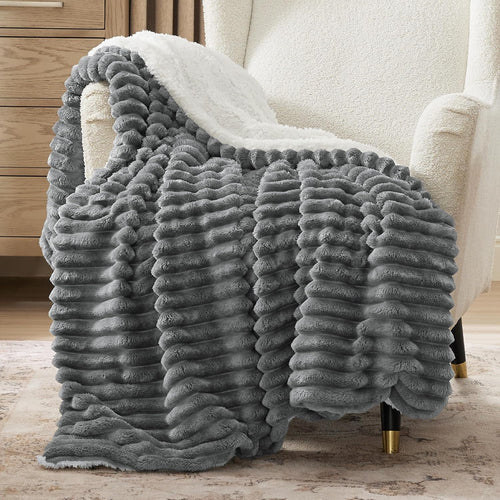 Verenza dark grey sherpa throw blanket on sofa